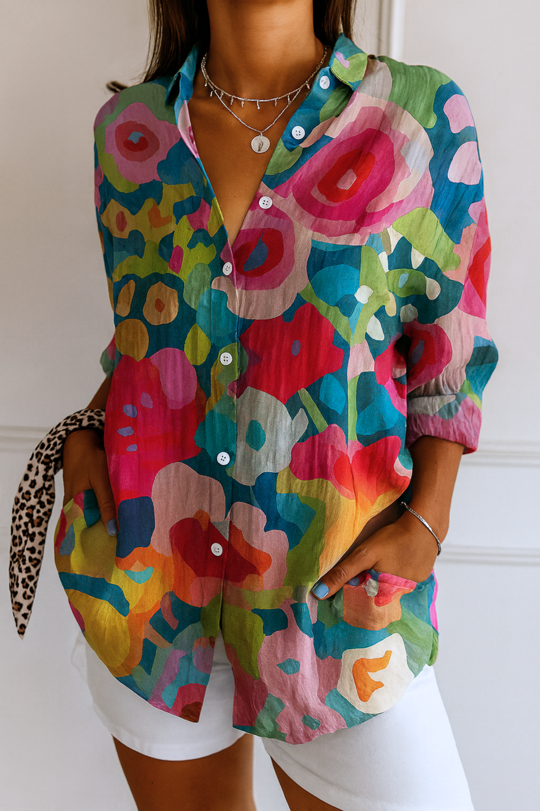 אסטרא | חולצת בלוז עם דפוס צבעוני